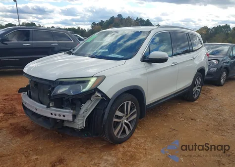 2016 Honda Pilot Touring z USA, uszkodzony, nr VIN 5FNYF6H92GB040275